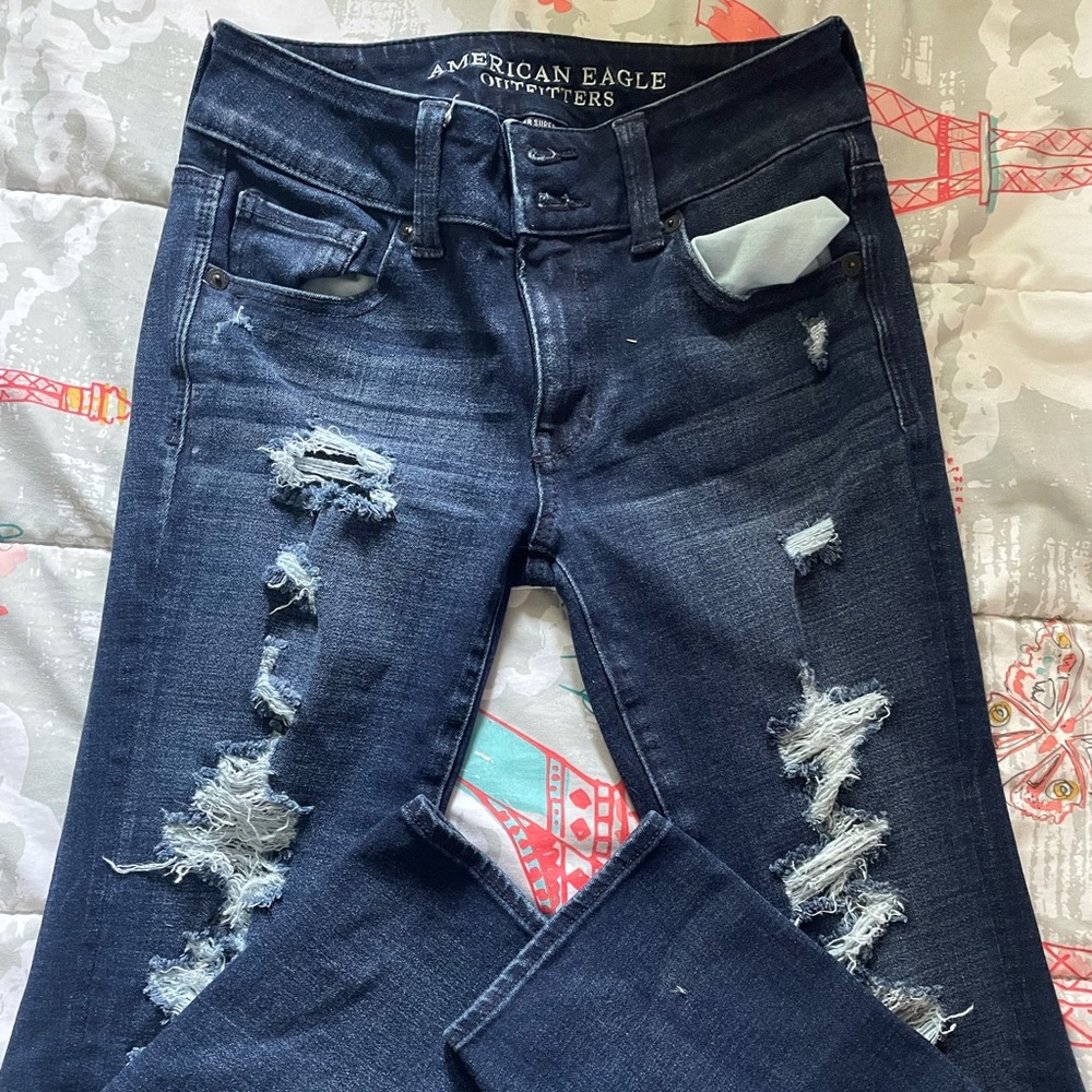 Boot cut AE jeans, like new! They are a size 4, my 8 year wore them.